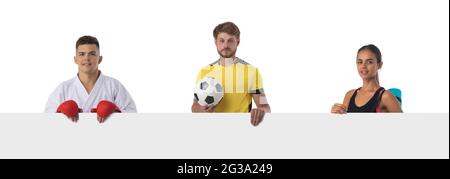 Group of sports people presenting empty banner with copy space for text isolated on white background Stock Photo