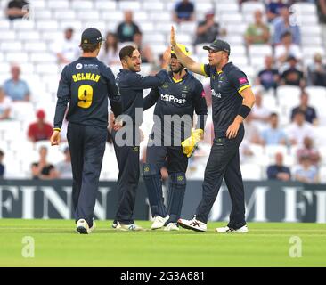 14 June, 2021. London,UK. Glamorgan’s Andrew Salter celebrates with team mates after getting the wicket of Surrey’s Sam Curran as Surrey take on Glamorgan in the Vitality T20 Blast cricket match at The Kia Oval. David Rowe/ Alamy Live News. Stock Photo