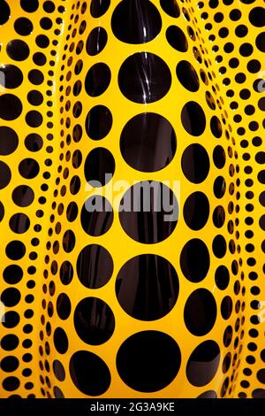 23 July 2016 - Close-up of yellow pumpkin with black dots sculpture, Yayoi Kusama exhibition at Victoria Miro art gallery in London, UK Stock Photo