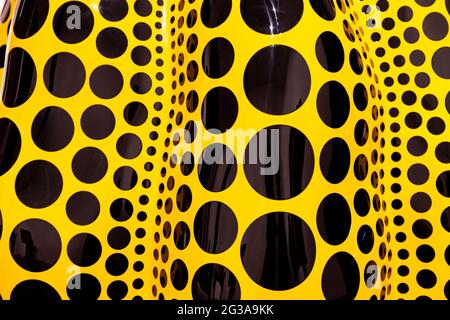 23 July 2016 - Close-up of yellow pumpkin with black dots sculpture, Yayoi Kusama exhibition at Victoria Miro art gallery in London, UK Stock Photo