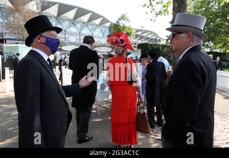 Racegoers queue up to enter the course ahead of day one of Royal Ascot at Ascot Racecourse. Picture date: Tuesday June 15, 2021. Stock Photo