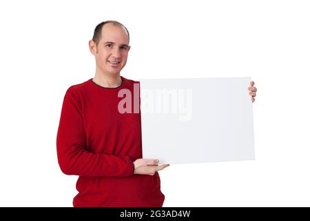 A boy holding a white panel Stock Photo