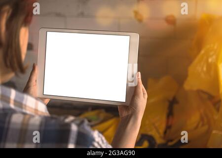 Tablet screen mockup, background of house construction, copy space Stock Photo