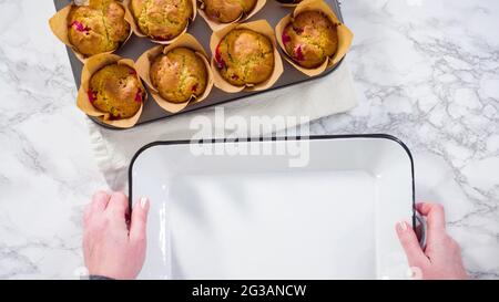 Flat lay. Step by step. Cooling freshly baked cranberry muffins. Stock Photo