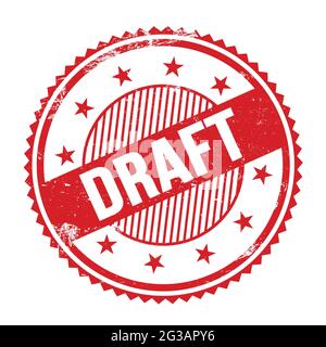 DRAFT text written on red grungy zig zag borders round stamp. Stock Photo