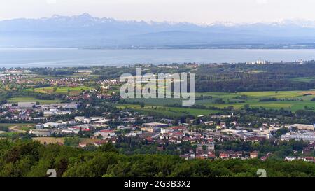 View from Gehrenberg to Markdorf with neighboring communities, Germany. In the background Lake Constance and the Swiss Alps Stock Photo