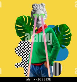Contemporary art collage. Young man headed of antique statue head. Stock Photo