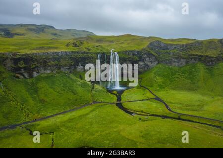 Aerial view of Seljalandsfoss - most famous best known and visited waterfalls in Iceland. Stock Photo