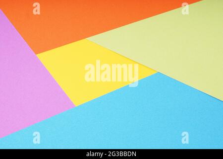 multicolor paper background with 5 different colors in triangle and rhombus shapes Stock Photo