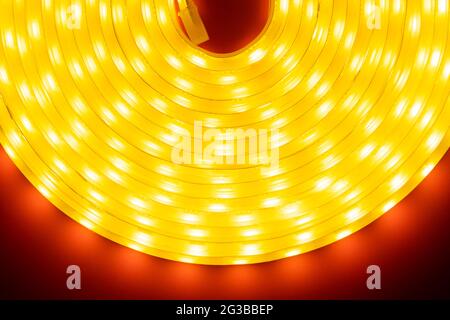 a roll of LED decorative light, golden glow strip. Stock Photo