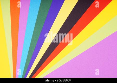multicolored sheets of paper in fan-shaped pattern background Stock Photo