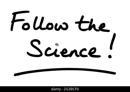 Follow the Science! handwritten on a white background. Stock Photo