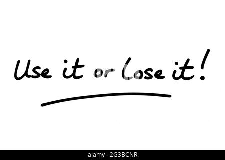 Use it or lose it! handwritten on a white background. Stock Photo