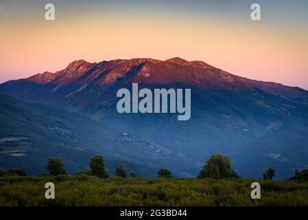 Montseny mountain, seen from the Pla de la Calma meadow, with the view of Turó de l'Home and Agudes summits at sunset (Barcelona, Catalonia, Spain) Stock Photo