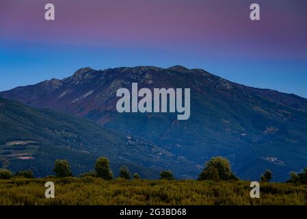 Montseny mountain, seen from the Pla de la Calma meadow, with the view of Turó de l'Home and Agudes summits at sunset (Barcelona, Catalonia, Spain) Stock Photo