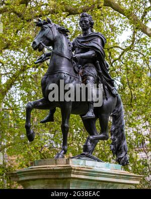 Statue of King William III, located in the historic St. James’s Square in London, UK. Stock Photo