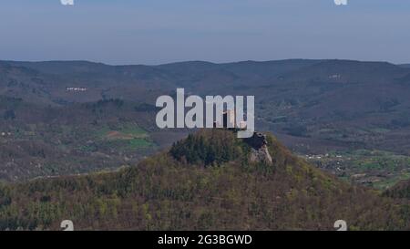 Beautiful panoramic view over the southern Palatinate Forest near Annweiler, Germany with reconstructed medieval castle Trifels on a rocky hill. Stock Photo