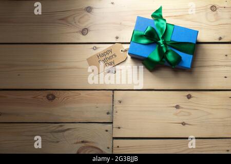 Fathers day gift box wrapped with ribbon Stock Photo