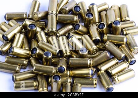 A lot of cartridges for a traumatic gun on a white background Stock Photo