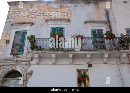 The front of an old white house in Ostuni ('The White City'), Puglia, Italy Stock Photo