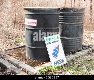 Recycle center for used oil with 2 barrels Stock Photo