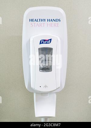 Los Angeles, CA - June 14, 2021: Hand sanitizing station at work COVID-19 Stock Photo
