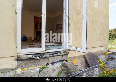 Broken glass after break in at glas door Stock Photo