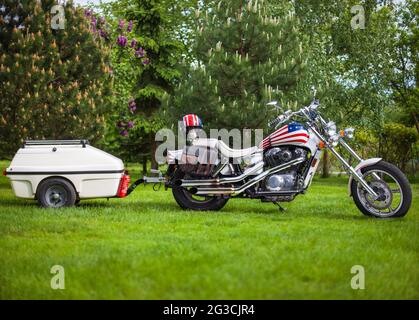 Poland, Bydgoszcz - Jun 03, 2021: HONDA Shadow VT-1100C 1988r, chopper motorcycle with a caravan. Stock Photo