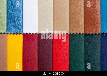 Background image - stripes of multi-colored factual leather. Stock Photo