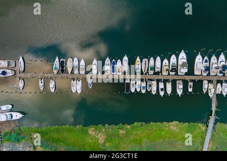 Amazing panoramic view little harbour for many boat floating near the ocean in USA Stock Photo