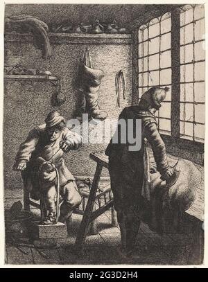 Shoemakers; Professions. A man treated leather, standing behind a table and a seated man makes a shoe in a shoemaker. Stock Photo