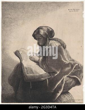 Reading old woman. An old woman, probably Rembrandt's mother, Neeltgen Willemsdr from Zuydtbroeck, possibly presented as the prophetess Anna. She reads in a book that is opened at her lap. Her foot rests on a footstew. Stock Photo