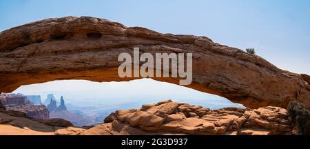 CANYONLANDS NATIONAL PARK, UTAH - CIRCA AUGUST 2020: Mesa Arch is a pothole arch on the eastern edge of the Island in the Sky mesa in Canyonlands Nati