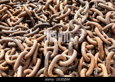 Background from huge old rusty anchor chains Stock Photo