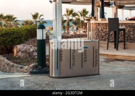 Garbage in trash cans with sorted garbage. Recycling of garbage Stock Photo