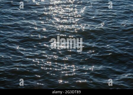 Areal shot of deep blue and rough sea with lot of sea spray.Blue ...