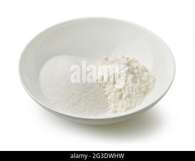 bowl of sugar and corn starch isolated on white background Stock Photo