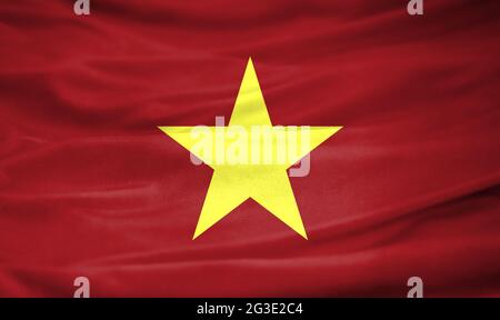 Realistic flag of Vietnam on the wavy surface of fabric Stock Photo