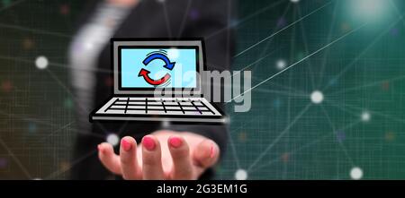 Upgrade concept above the hand of a woman in background Stock Photo