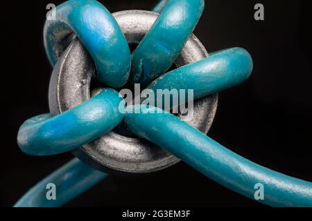 Close up of a ferrite bead inductor. An electrical element that suppresses high-frequency electronic noise in electronic circuits. Stock Photo