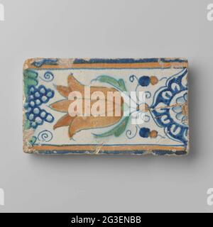 Edge tile. Edge tile with a multicolored (blue, green and orange) tulip between a rosette motif and a grape tray. Stock Photo