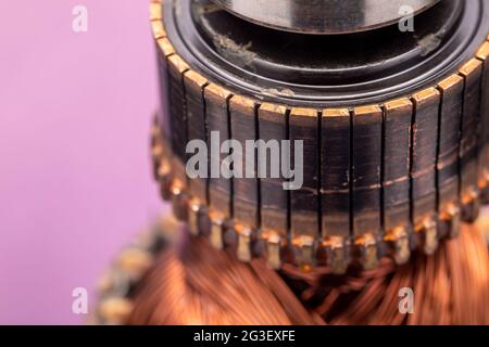 Copper commutator bar of the electric motor close up. Electric motor rotor. Stock Photo