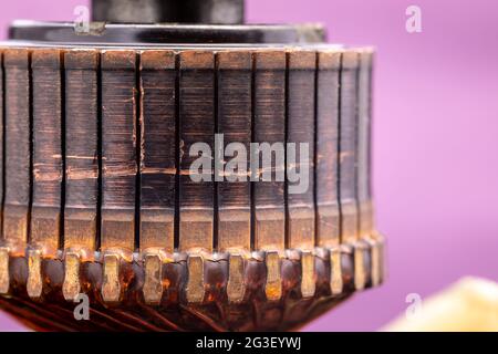 Copper commutator bar of the electric motor close up. Electric motor rotor. Stock Photo