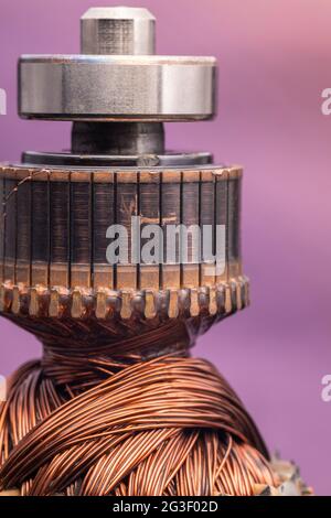 Copper commutator bar of the electric motor close up. Electric motor rotor. Stock Photo