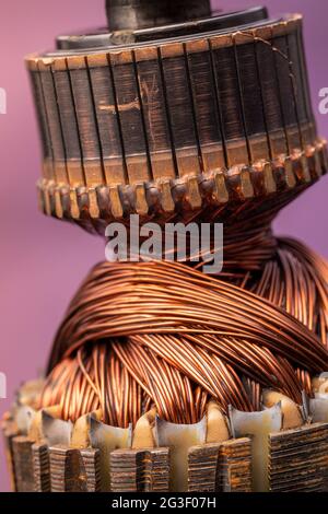 Copper commutator bar of the electric motor close up. Electric motor rotor. Stock Photo