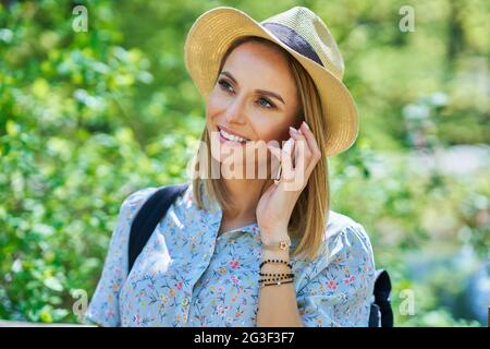 A nice and happy girl with smarfone Stock Photo