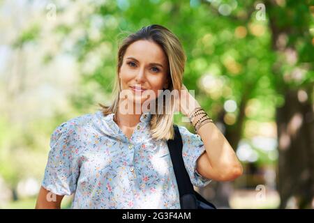A nice and happy girl with smarfone Stock Photo