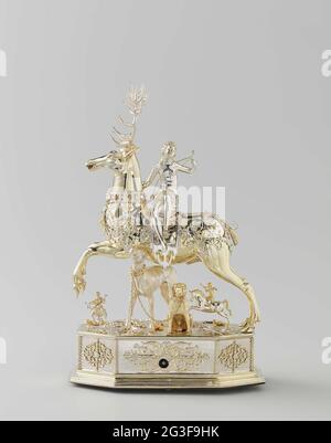 Table automaton in the form of Diana on a stag. This is an expensive toy for the entertainment of dinner guests. It can roll over the table, since the base of the ‘sculpture’ has wheels and a movement to propel it forward. The head of the stag can be removed and its body filled with wine. The guest in front of whom Diana stops may take the first drink. Stock Photo