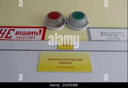 Entrance to the radiological office with warning signs in English and Russian (St. Petersburg, Russia) Stock Photo