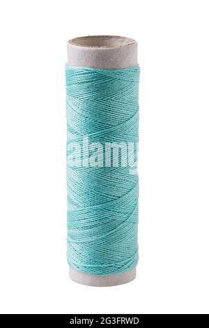 One spool of emerald threads isolated on white background Stock Photo